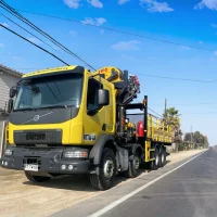Volvo VM 330 (2022) Amarillo + Grúa ING 52.500C